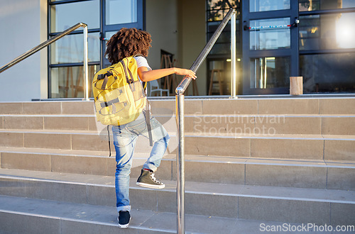 Image of Education, back to school and student in the morning ready to start learning and studying at school. Child with backpack walking on academy steps going to class for study and academic lifestyle