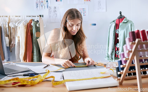 Image of Fashion, designer and creative with woman planning on fabric for manufacturing, retail and tailor in workshop studio. Pattern, textile and clothes with girl and tape for sewing, factory and boutique