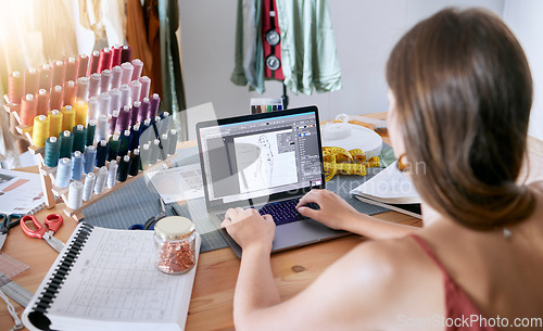 Image of Fashion, clothes and digital designer woman working on a computer planning clothing production. Online, web and textile design of a seamstress, tailor and stylist employee in a creative work studio