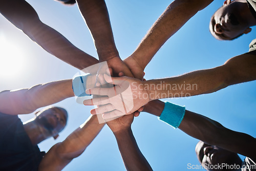 Image of Hands, teamwork and unity for motivation below in sports collaboration, strategy or game cooperation outside. Hand of group piling for team coordination, agreement or partnership in sport meeting