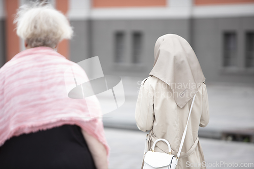 Image of People with Religious Clothes