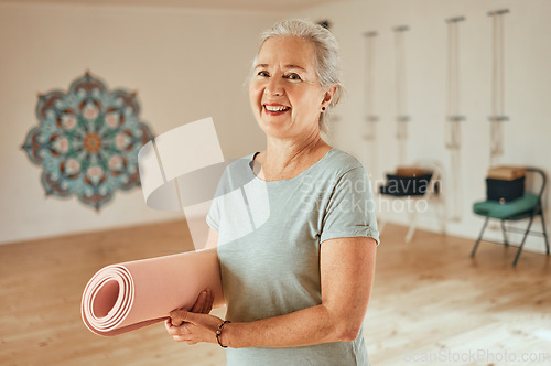 Image of Senior woman, yoga and mat, portrait and fitness, wellness and healthy lifestyle in sports studio, gym and club. Happy old woman, retirement and yoga mat for pilates workout, exercise and happiness