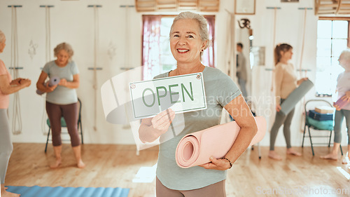 Image of Yoga, open sign and elderly woman in studio with fitness for mature women, exercise and pilates for health and wellness. Balance, zen and workout portrait, training motivation for senior people.