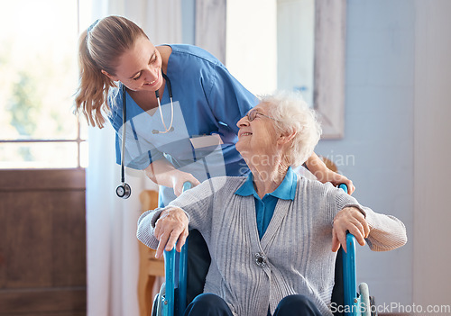 Image of Nurse, home and elderly woman with a disability in a wheelchair in medical nursing facility. Happy, healthcare and doctor helping and talking to disabled senior lady in retirement house in Australia.