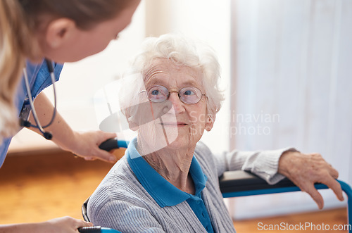 Image of Disability, nursing and senior woman with a doctor for care, consultation and medical help at a hospital. Healthcare, communication and elderly patient in a wheelchair with a nurse in a home