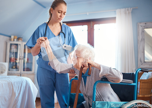 Image of Disability, woman in wheelchair and bedroom with nurse or doctor helping in retirement or nursing home. Senior care, disabled grandma and healthcare, girl caregiver, support and help out of chair.