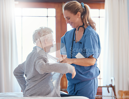 Image of Nurse, healthcare and senior woman in nursing home with physician helping her dress up. Disability, rehabilitation and female medical worker with retired patient in home with care, empathy or support