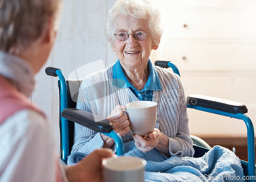 Image of Senior, wheelchair and woman patient with morning coffee in a consulting medical conversation. Mobility disability, healthcare and retirement nursing home female happy talking to a caregiver nurse