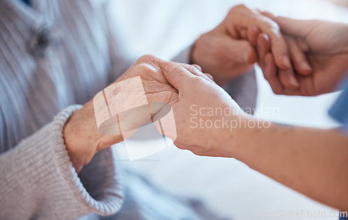 Image of Elderly woman hands, support and holding healthcare worker for medical care or help walking. Retirement care, senior person and holding hands for volunteer caregiver service in health community