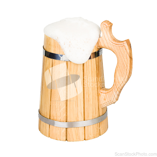 Image of Wooden beer mug with beer isolated on white