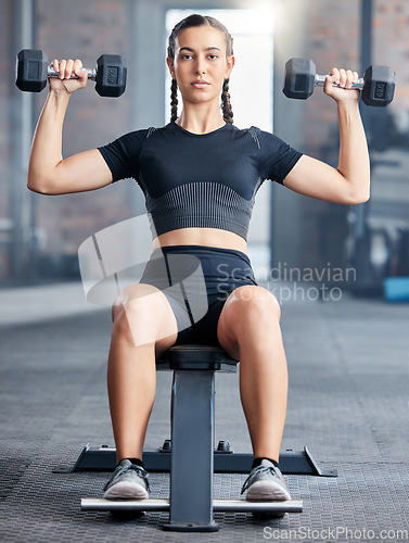 Image of Woman, fitness and weightlifting in wellness gym for healthcare motivation and bodybuilding. Weight training, healthy muscle exercise and strong bodybuilder or sports athlete trainer in health club