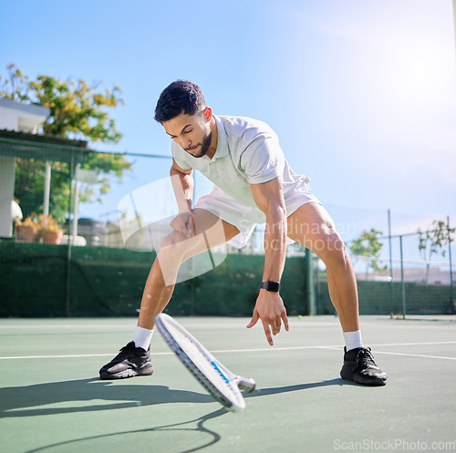 Image of Tennis, sports and knee pain on court after training, match or game outdoors. Healthcare, male athlete or tennis player drop racket with leg injury, inflammation or joint pain after exercise accident