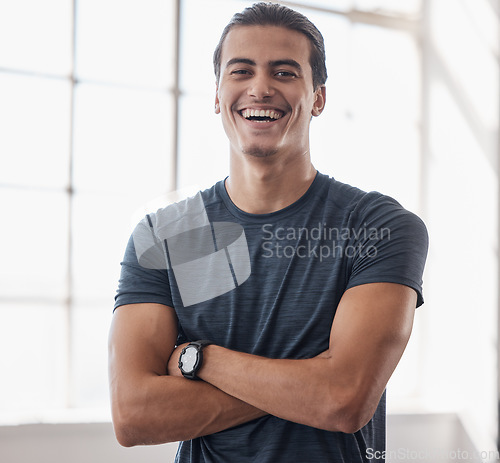 Image of Fitness, laughing and portrait of man happy for muscle growth, gym workout success or achievement of body transformation goals. Health, wellness and strong personal trainer with pride in gym training