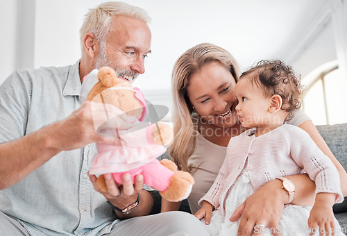 Image of Toy, grandparents and baby play, happy and smile together in family home. Family, teddy bear and senior people with girl kid, development and child bonding with happiness, love and care in house