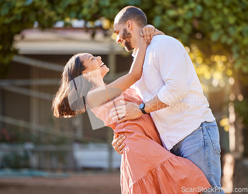 Image of Happy, love and couple dance in nature for romantic summer date together in Cancun sunshine. Happiness, smile and care of man dancing with beautiful partner for outdoor fun and romance.