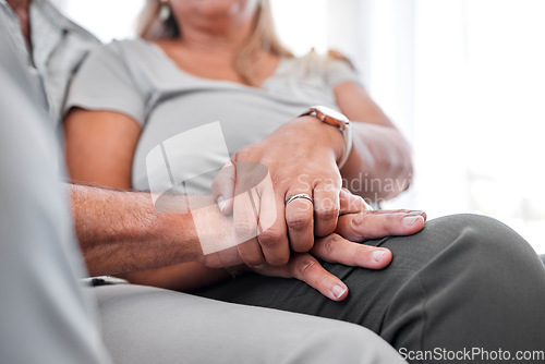 Image of Senior couple, hold hands and zoom with love, support or trust in marriage with rings, partner or comfort in home. Married man and woman hand, faith and hope in healthy relationship and relax in home