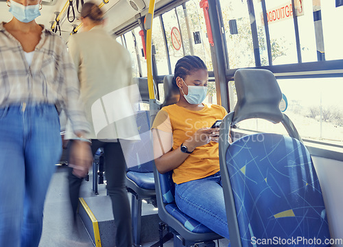 Image of Travel, covid and woman on a bus with face mask for compliance, safety and bacteria protection in a city. Corona, public transport and girl riding busy transportation downtown during global pandemic