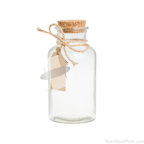 Image of Empty vintage bottle with paper label