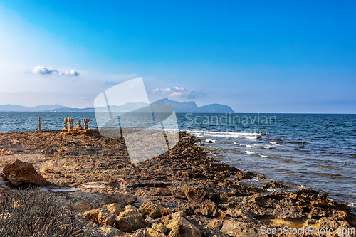 Image of Group of sculptures, statues of people on beach in Can Picafort. Can Picafort, Balearic Islands Mallorca Spain.