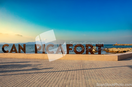 Image of Signpost on promenade. Can Picafort Beach. Balearic Islands Mallorca Spain.