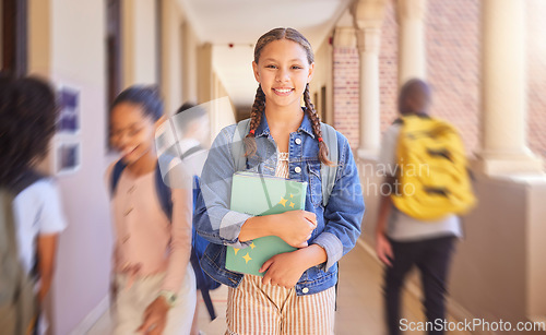 Image of Student, portrait smile and class for school, education or learning with vision for career ambition in development. Happy female teenager smiling ready to learn, scholarship or goals at busy academy