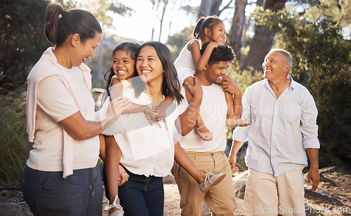 Image of Big family walking in park, summer and freedom together in outdoor fresh air . Happy family, parents and grandparents in garden with excited kids to relax, bond and enjoy quality time, love and fun