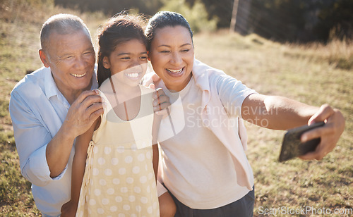 Image of Selfie, phone and family in countryside for outdoor journey, travel or adventure together with mother, child and senior man. Happy family, Philippines and smartphone photography with kid for holiday