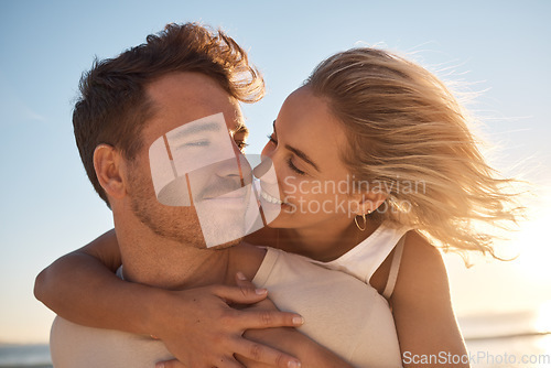 Image of Couple, love and hug, together outdoor for romantic date and care with bonding during sunset. Man, woman and romance, honeymoon or anniversary celebration with support, trust and embrace.