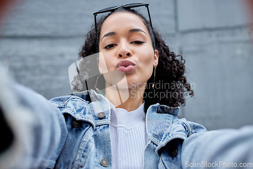 Image of City, woman taking a selfie and face with pov outside for freedom or peace. Fashion or glasses, positive or casual and happy young female model pose for confidence with a pout facial expression