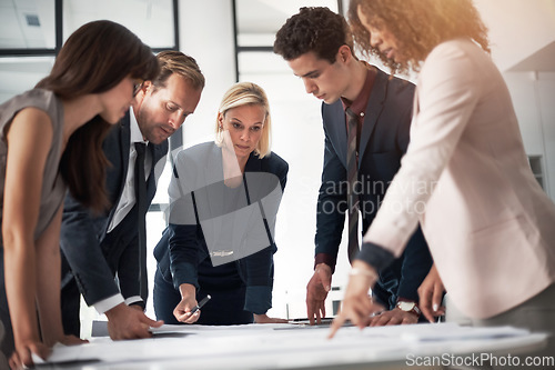 Image of Business people, blueprint and meeting collaboration in team strategy for construction planning at office. Group of engineers in teamwork discussion, floor plan or documents for architecture project