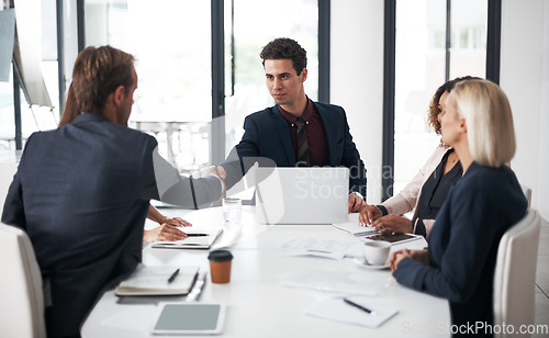 Image of Business people, handshake and meeting for agreement, partnership or collaboration at office conference. Businessman shaking hands with employee in recruiting, team growth or hiring deal at workplace