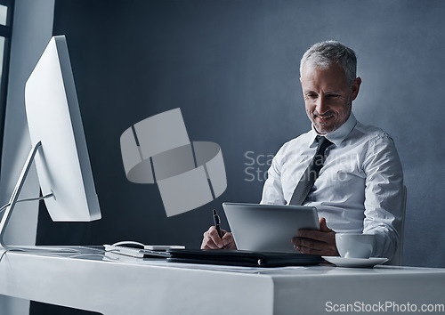 Image of Tablet, computer and business man at desk online for social media, internet and browse website in office. Network, corporate worker and mature male person on digital tech, writing notes and planning