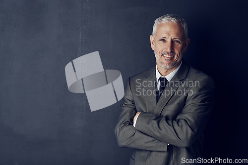 Image of Smile, confidence and portrait of lawyer in mockup, arms crossed and smile on dark background in studio space. Boss, ceo and happy attorney with happy professional career, senior law firm executive.