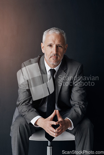 Image of Mockup, chair and serious portrait of businessman, lawyer or attorney, confidence on dark background and studio. Boss, ceo and professional business owner, proud senior executive director at law firm