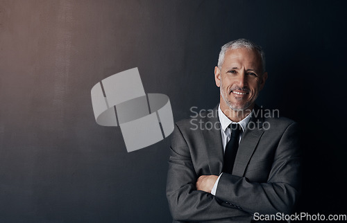 Image of Portrait, smile and businessman with mockup, confident lawyer or attorney on dark background in studio. Boss, ceo and professional business owner, happy senior director at law firm with arms crossed.