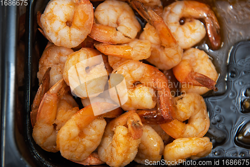 Image of Pickled shrimp in plastic container