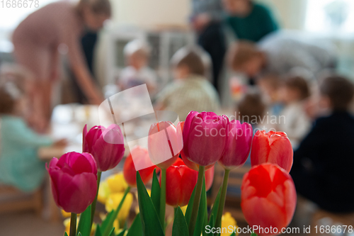 Image of Concept of spring holiday, womens day or mothers day in montessori school