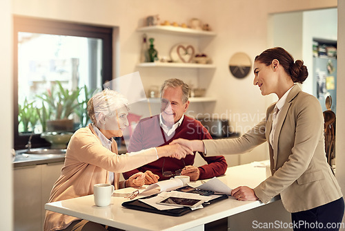 Image of Senior couple, accountant and handshake in finance, budget or agreement for consultation at home. Happy elderly man and woman shaking hands with consultant lawyer for financial planning or investment