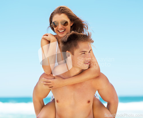 Image of Piggyback, portrait and a couple at the beach in summer for bonding, holiday or an ocean date. Smile, love and a man and woman being playful at the sea for a vacation, happiness or travel in Bali