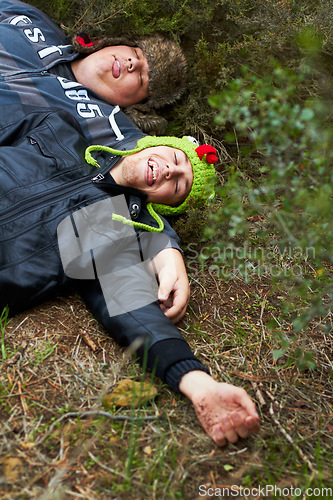 Image of Drunk, hangover and boys with friends sleeping outdoor on a field together in the morning after a party. Grass, tired or alcoholism with a plus size man and friend asleep on the ground in a park