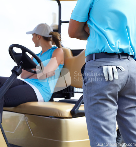Image of Golf cart, sports or golfers on course for fitness, workout or exercise with teamwork in collaboration. Woman driver, man golfing or closeup of athletes training in game practice together in vehicle