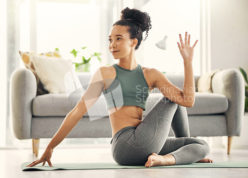 Image of Stretching, body and yoga by woman on living room floor, training or mental health exercise at home. Arm, stretch and lady with flexible fitness or pilates, workout or balance, meditation or wellness