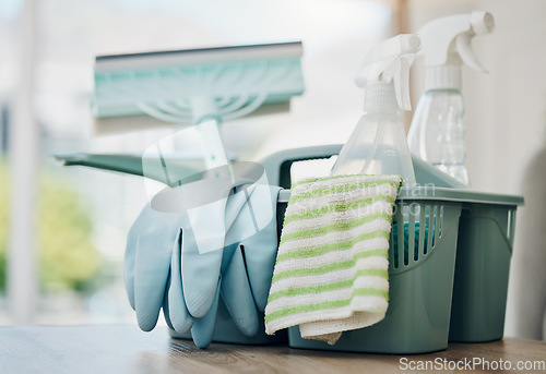 Image of Cleaning supplies, product and chemical spray with cloth and gloves, household maintenance and service. Closeup of cleaner tools in basket, janitor equipment and disinfectant with sanitizer detergent