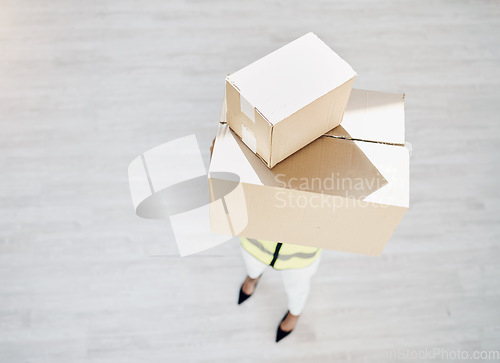 Image of Delivery, courier person and boxes or package from above for logistics, cargo or shipping industry. A worker or employee with cardboard box or parcel from supply chain for distribution service mockup