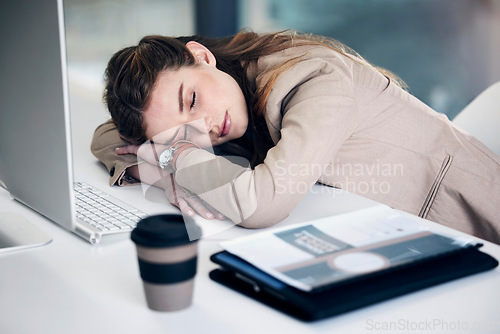 Image of Tired business woman, sleeping and burnout, stress or mental breakdown on office desk. Exhausted female person or employee resting head on table in depression, anxiety or overworked at the workplace