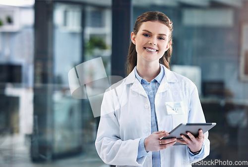 Image of Telehealth, tablet or portrait of happy doctor in hospital with research to search for medicine on online media. Woman, smile or medical healthcare professional browsing on tech app to chat in clinic