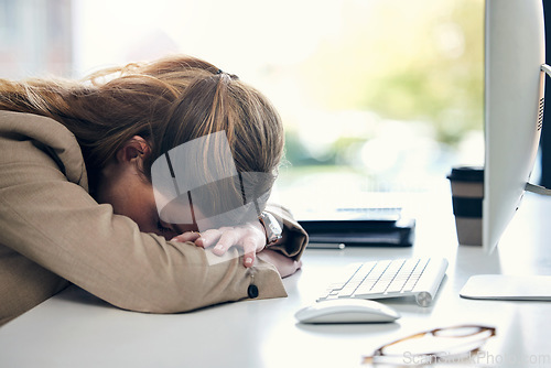 Image of Tired business woman, sleeping and desk in burnout, stress or mental breakdown at office. Exhausted female person or employee resting head on table in depression, anxiety or overworked at workplace