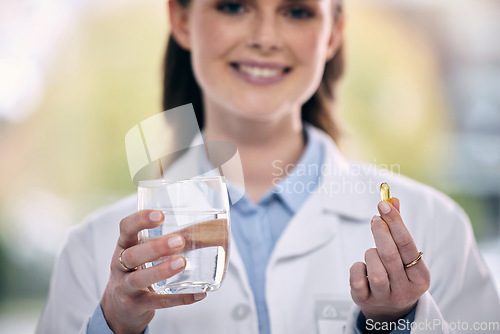 Image of Portrait, water glass or doctor in hospital with pills or supplements for healthcare vitamins or medicine. Smile, medication tablets or hands of happy medical worker giving cure for allergy or pain