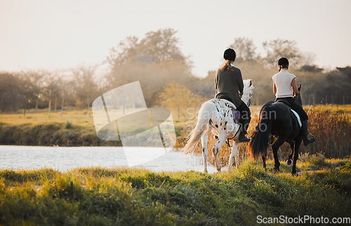 Image of Horseback riding, freedom and friends in nature by the lake during a summer morning with a view. Countryside, equestrian and female riders bonding outdoor together for wilderness travel or adventure