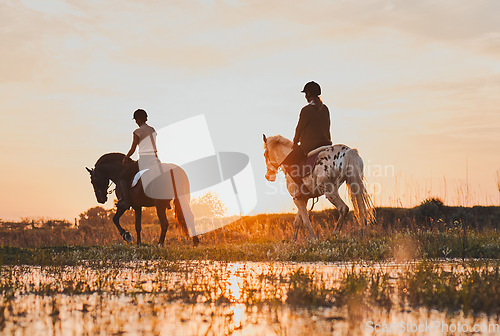 Image of Horseback, women and friends by lake in countryside at sunset with outdoor mockup space. Equestrian, girls and animals in water, nature and adventure to travel, journey or summer vacation together
